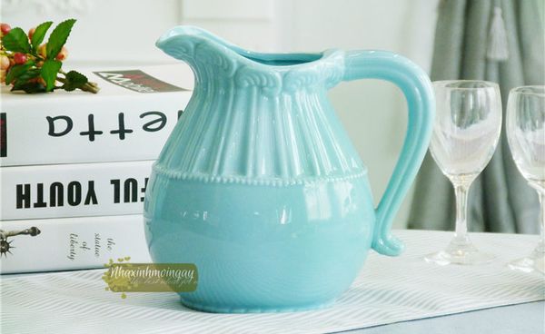 Bình sứ bầu có quai